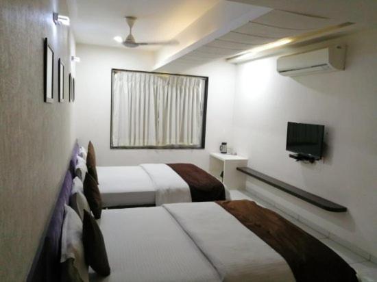 Hotel Best Velly Gandhinagar Bagian luar foto